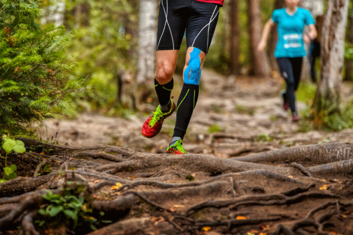 legs man runner in compression socks